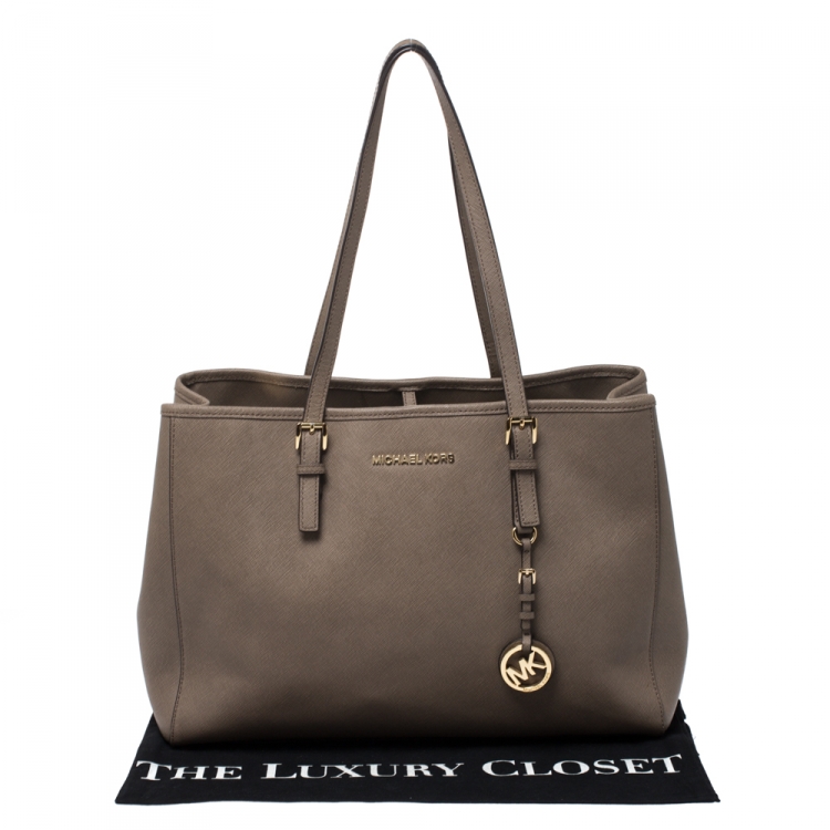 Pre Owned MICHAEL Michael Kors Beige Leather Medium Jet Set Travel Tote