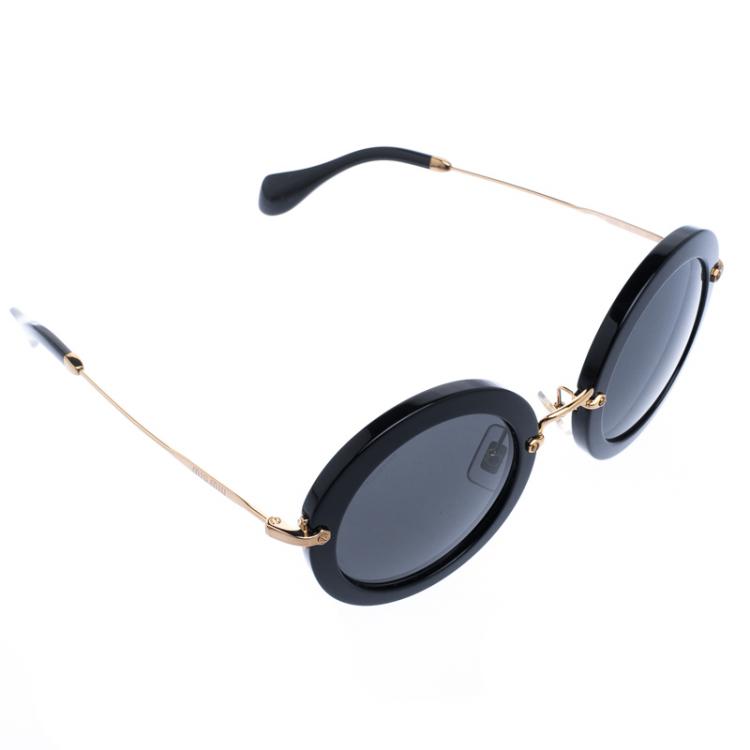 Miu Miu Black SMU 13N Round Sunglasses Miu Miu | The Luxury Closet