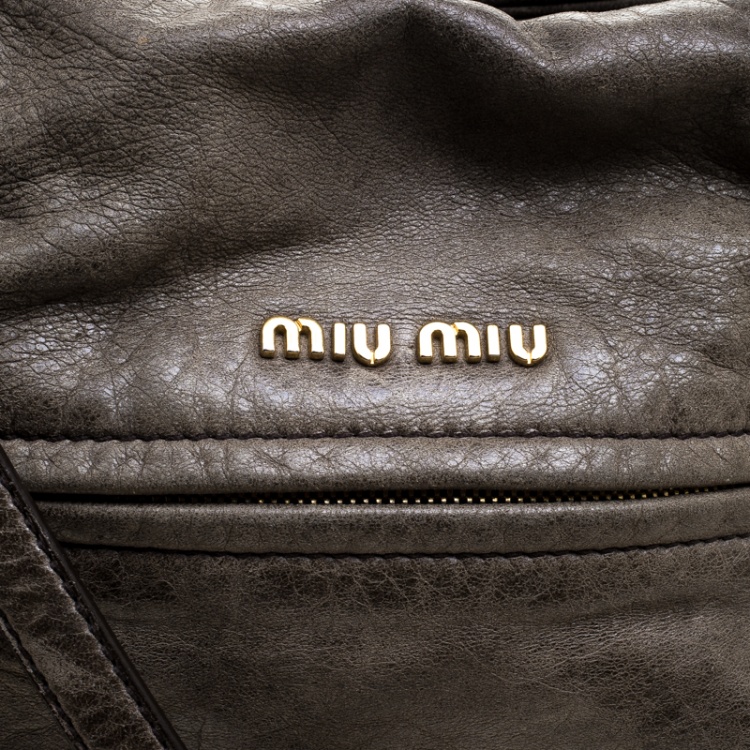 Pre Owned Miu Miu Khaki Distressed Leather Charm Satchel