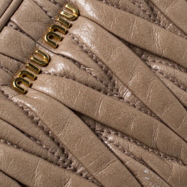 Pre Owned Miu Miu Beige Matelasse Nappa Leather Mini Zipper Shoulder Bag