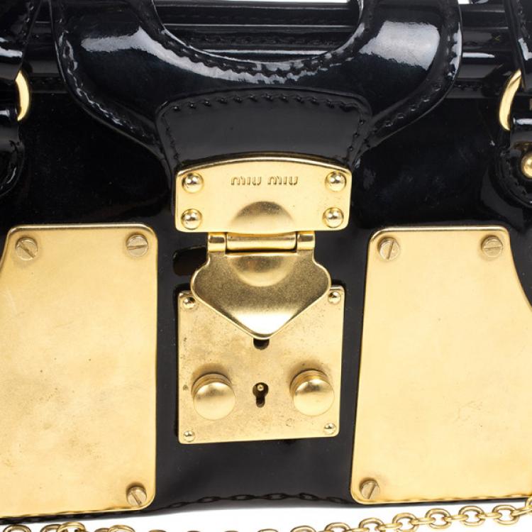 Pre Owned Miu Miu Black and Gold Framed Clutch