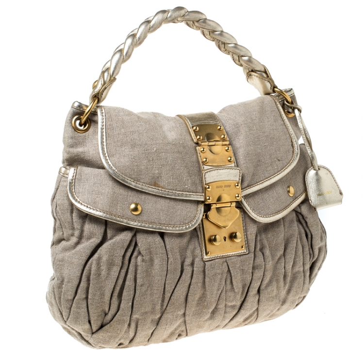 Pre Owned Miu Miu Beige/Gold Matelasse Fabric and Leather Coffer Hobo