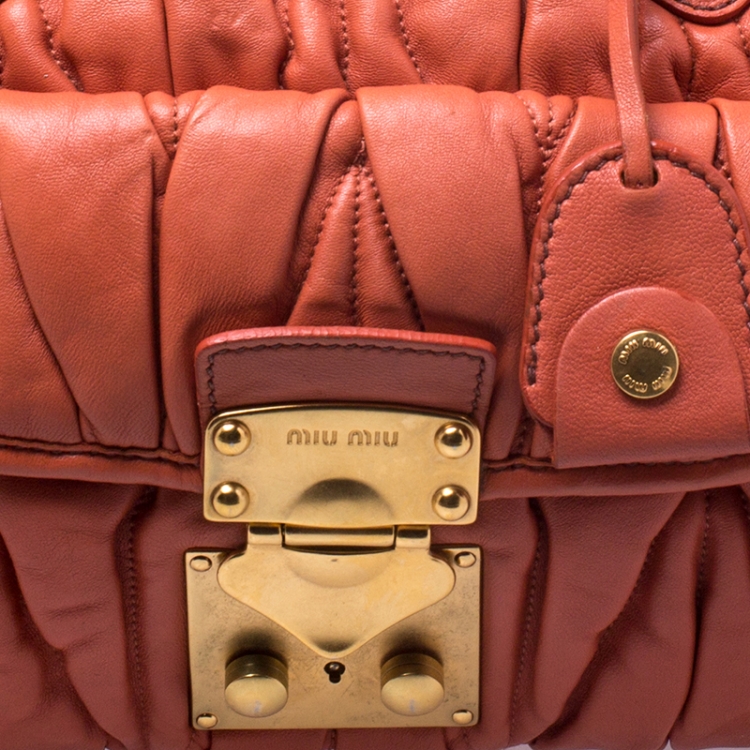 Pre Owned Miu Miu Orange Metalasse Leather Coffer Top Handle Bag