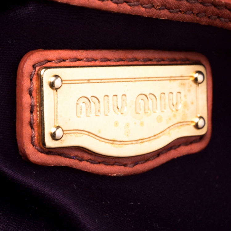 Pre Owned Miu Miu Orange Metalasse Leather Coffer Top Handle Bag
