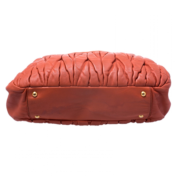 Pre Owned Miu Miu Orange Metalasse Leather Coffer Top Handle Bag
