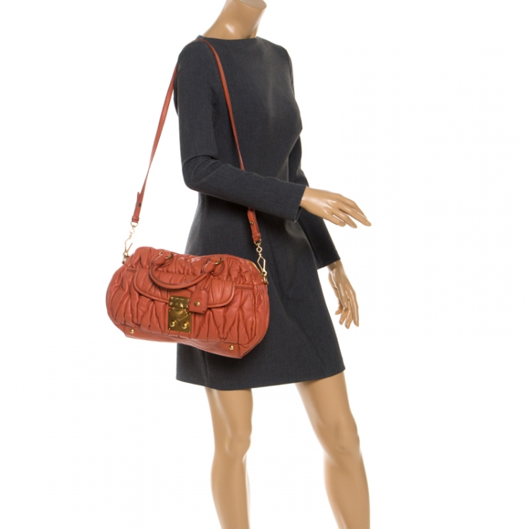 Pre Owned Miu Miu Orange Metalasse Leather Coffer Top Handle Bag