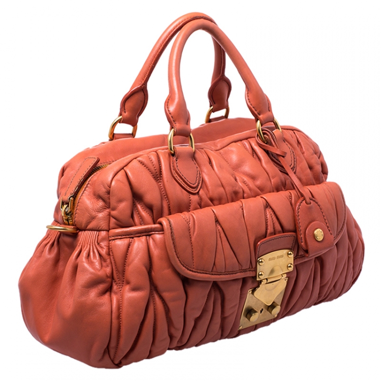 Pre Owned Miu Miu Orange Metalasse Leather Coffer Top Handle Bag