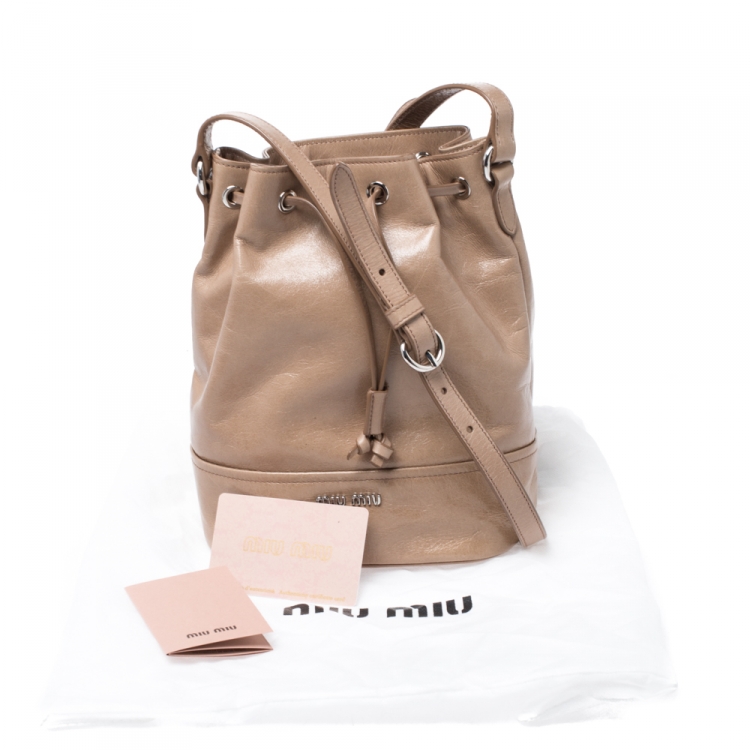 Pre Owned Miu MIu Cammeo Beige Leather Drawstring Bucket Bag