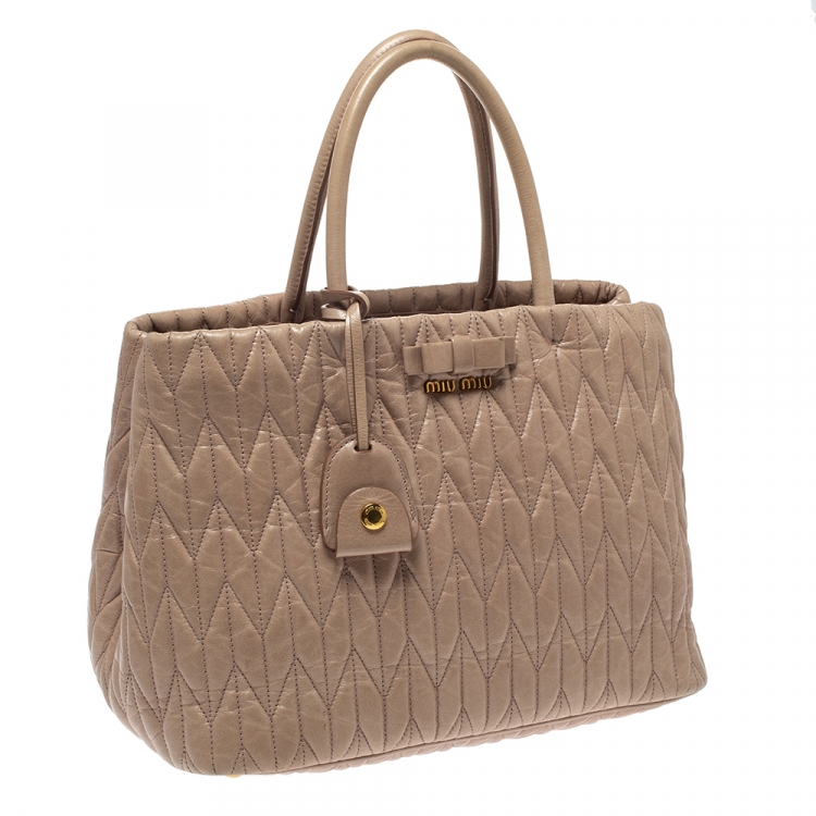 Pre Owned   Miu Miu Beige Metalasse Leather Covertible Tote