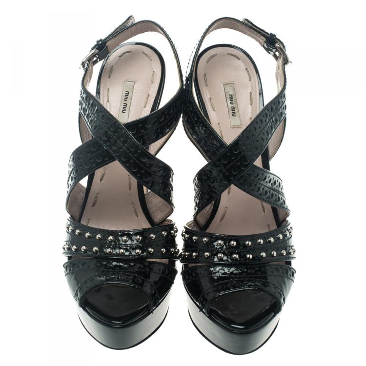 مملوكة مسبقًا Miu Miu Black Studded Brogue Leather Cross Ankle Strap Platform Sandals Size 37.5