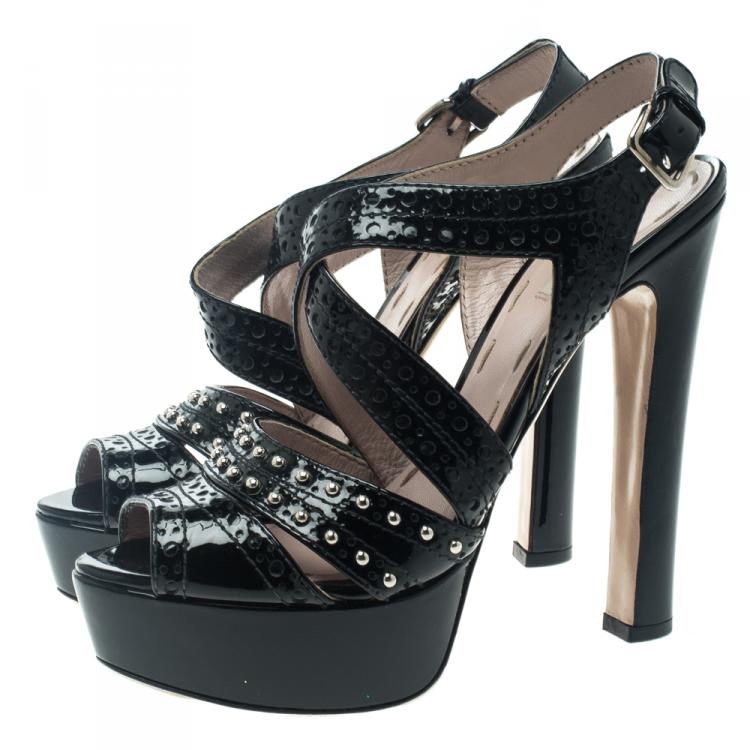 مملوكة مسبقًا Miu Miu Black Studded Brogue Leather Cross Ankle Strap Platform Sandals Size 37.5