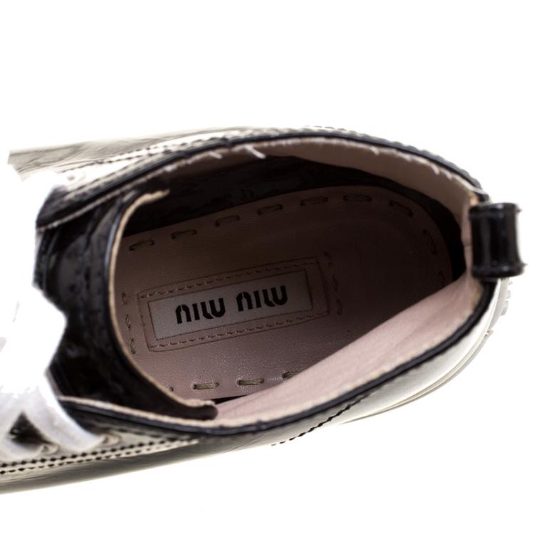 Pre Owned Miu Miu Black Patent Leather Studded Metal Cap Toe High Top Sneakers Size 39