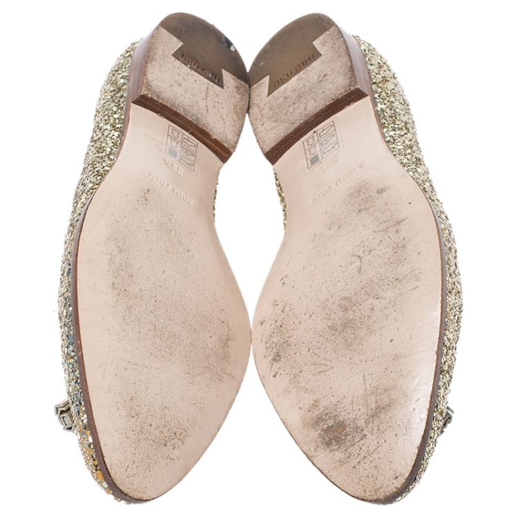 Pre Owned Miu Miu Gold Coarse Glitter Fabric And Leather Tassel Pointed Toe Flats Size 39.5