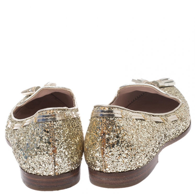 Pre Owned Miu Miu Gold Coarse Glitter Fabric And Leather Tassel Pointed Toe Flats Size 39.5