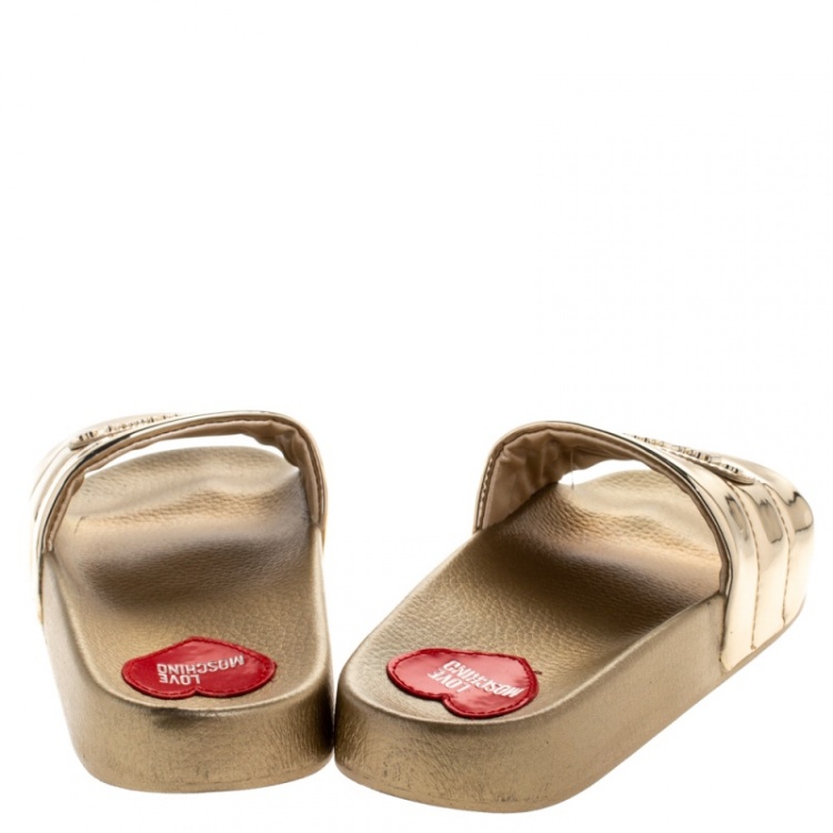 Pre Owned Love Moschino Metallic Gold Faux Leather Flat Slides Size 35