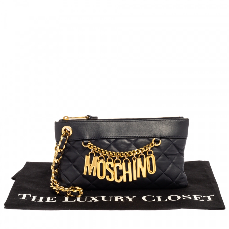 Pre Owned Moschino Navy Blue Quilted Leather Charms Wristlet Clutch