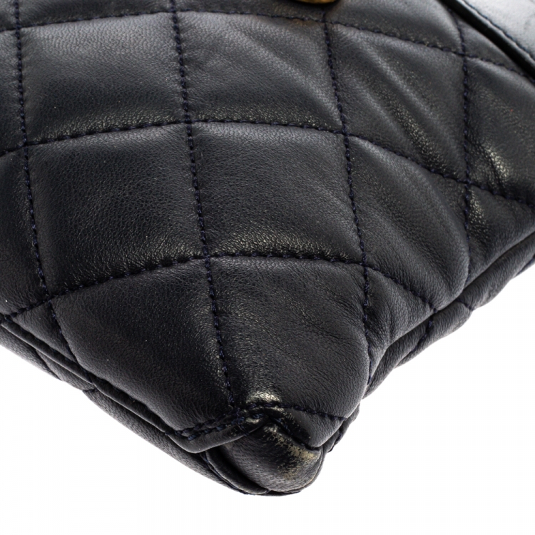 Pre Owned Moschino Navy Blue Quilted Leather Charms Wristlet Clutch