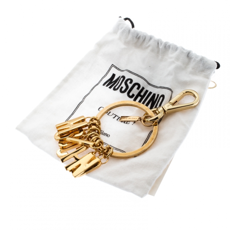 Pre Owned Moschino Gold Tone Logo Bag Charm
