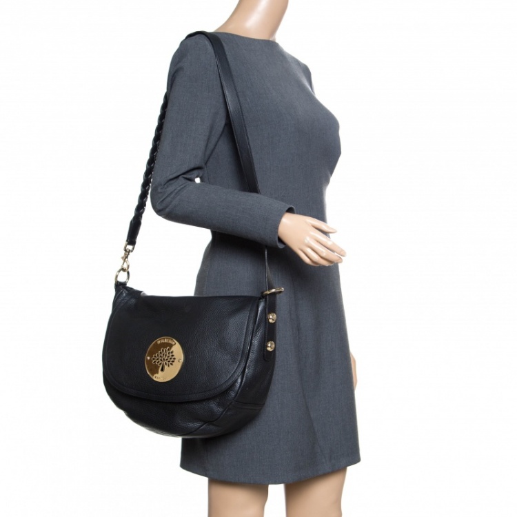 Black Daria mini leather clutch bag