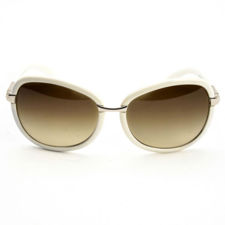 Pre Owned Prada Cream Round Woman Sunglasses