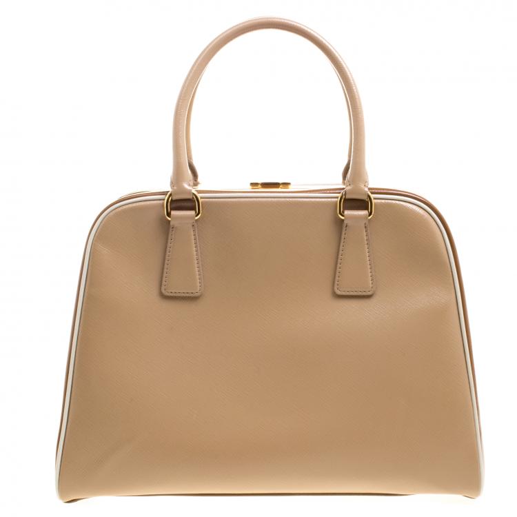Pre Owned Prada Beige/Caramel Patent Leather Pyramid Frame Top Handle Bag