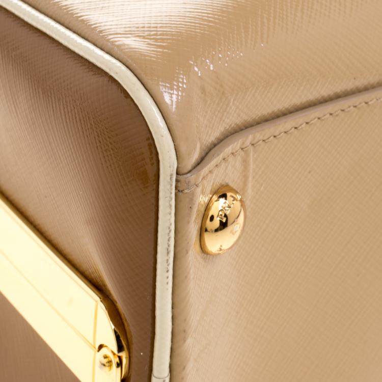 Pre Owned Prada Beige/Caramel Patent Leather Pyramid Frame Top Handle Bag