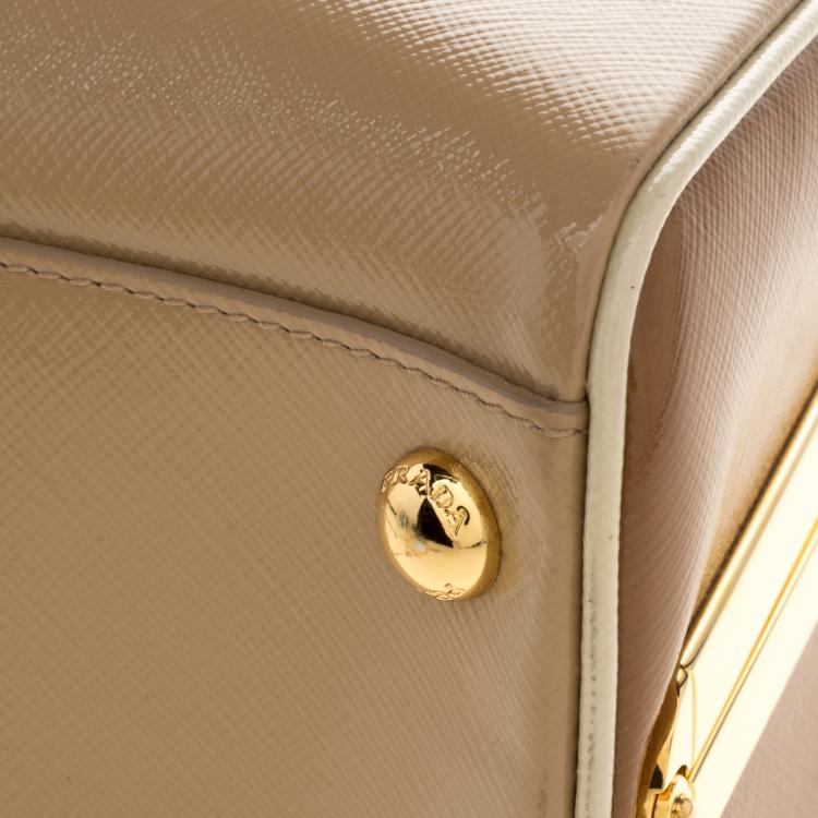 Pre Owned Prada Beige/Caramel Patent Leather Pyramid Frame Top Handle Bag
