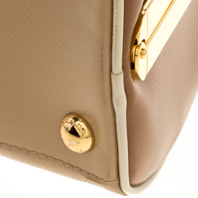 Pre Owned Prada Beige/Caramel Patent Leather Pyramid Frame Top Handle Bag