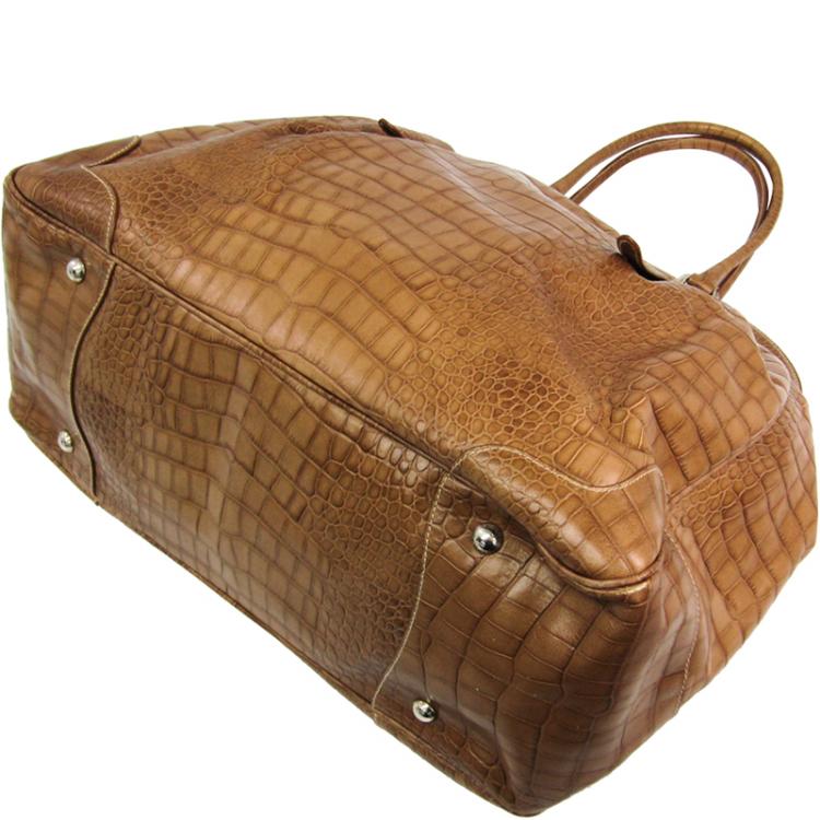 embossed leather satchel