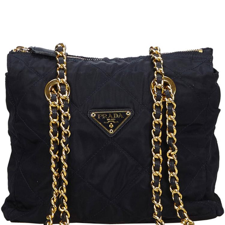 Black, quilted original Prada crossbody bag