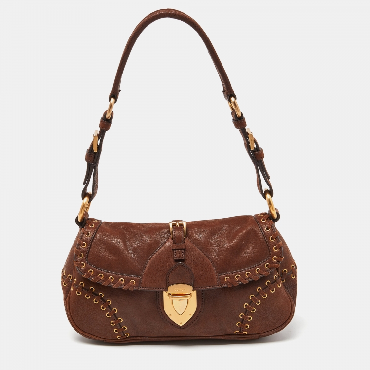 Pre Owned Prada Brown Leather Whipstitch Grommet Baguette Bag