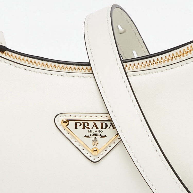 Pre Owned Prada Off White Leather Arqué Hobo