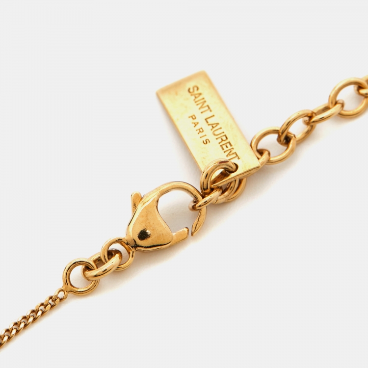 Pre Owned Saint Laurent Paris Gold Tone Opyum Charm Bracelet