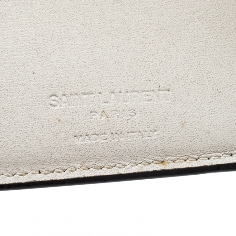 Pre Owned Saint Laurent Off White Leather Fragments East/West Bifold Wallet