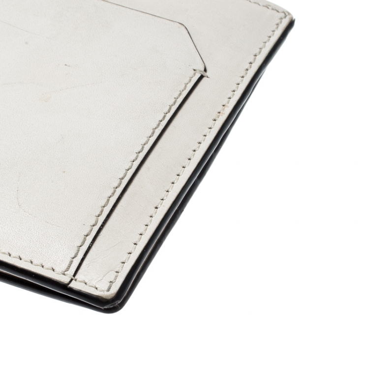 Pre Owned Saint Laurent Off White Leather Fragments East/West Bifold Wallet