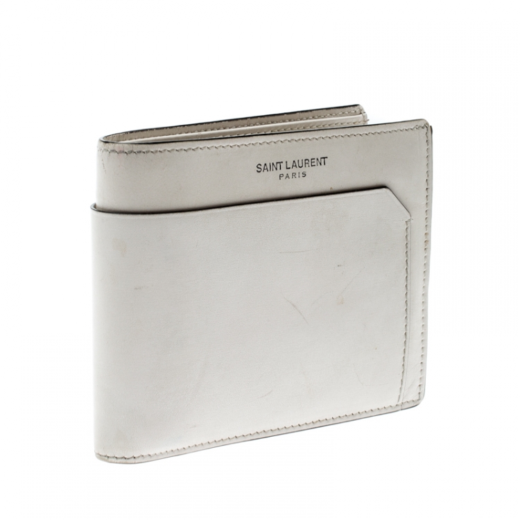 Pre Owned Saint Laurent Off White Leather Fragments East/West Bifold Wallet