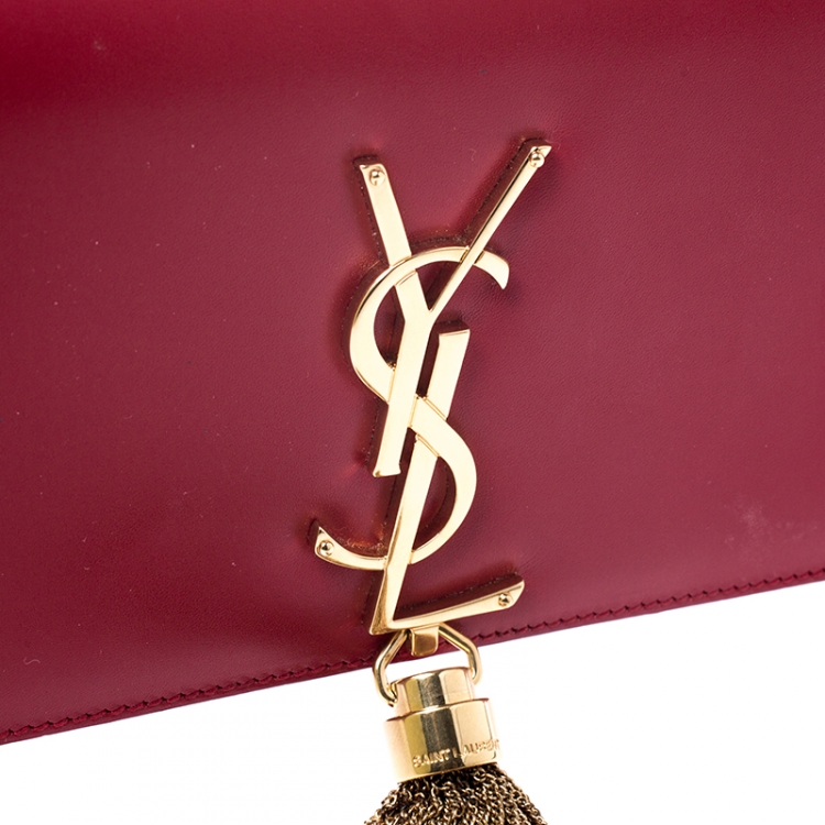 Pre Owned Saint Laurent Paris Red Leather Cassandre Tassel Clutch