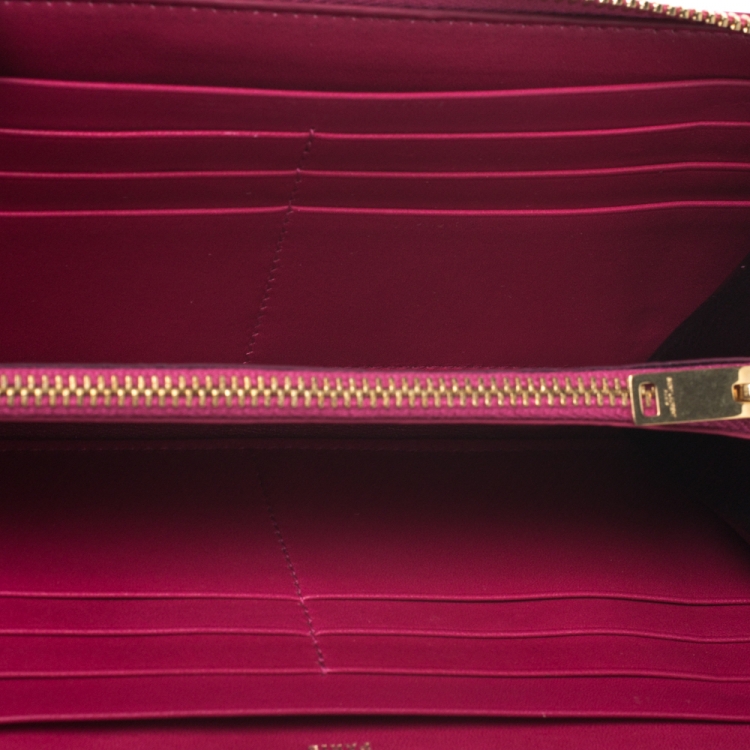 Pre Owned Saint Laurent Fuchsia Patent Leather Zip Around Wallet 