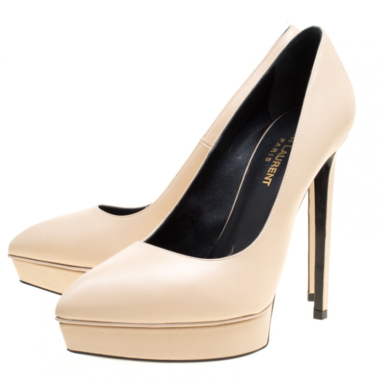 cream leather pumps