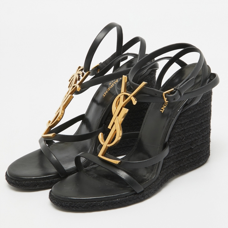 サンダル・ミュール Saint Laurent Black leather Cassandre wedges Cassandre 40 leather wedges in black - Saint Laurent | Mytheresa