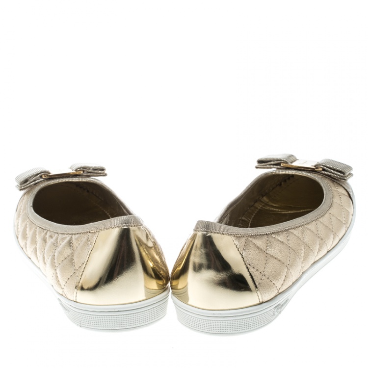 مملوكة مسبقًا Salvatore Ferragamo Metallic Gold Quilted Leather Rufina Sneaker Ballet Flats Size 38.5