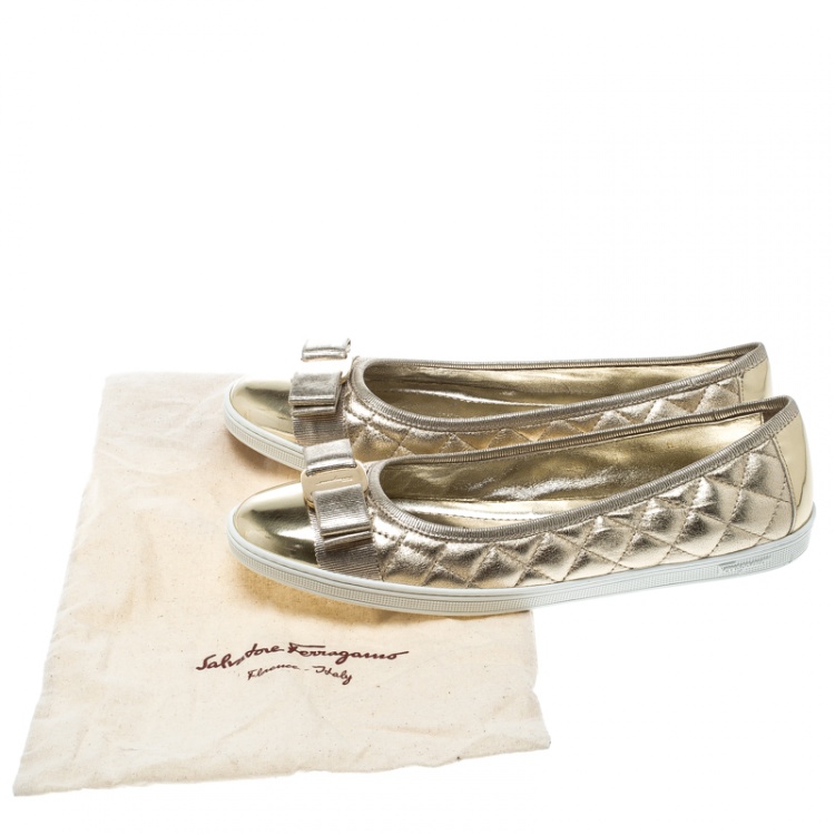 مملوكة مسبقًا Salvatore Ferragamo Metallic Gold Quilted Leather Rufina Sneaker Ballet Flats Size 38.5