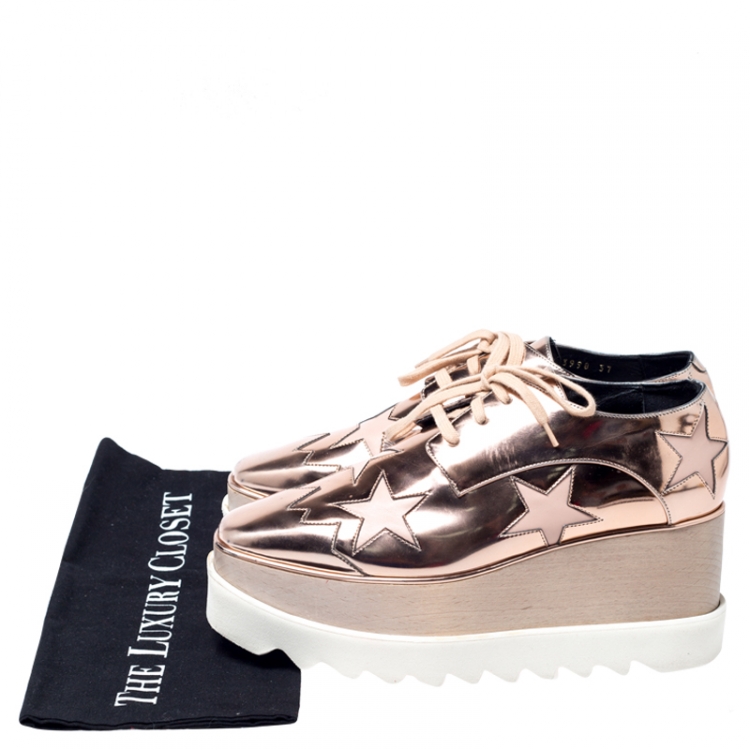 مملوكة مسبقًا Stella McCartney Metallic Bronze Faux Patent Leather Elyse Star Platform Sneakers Size 37