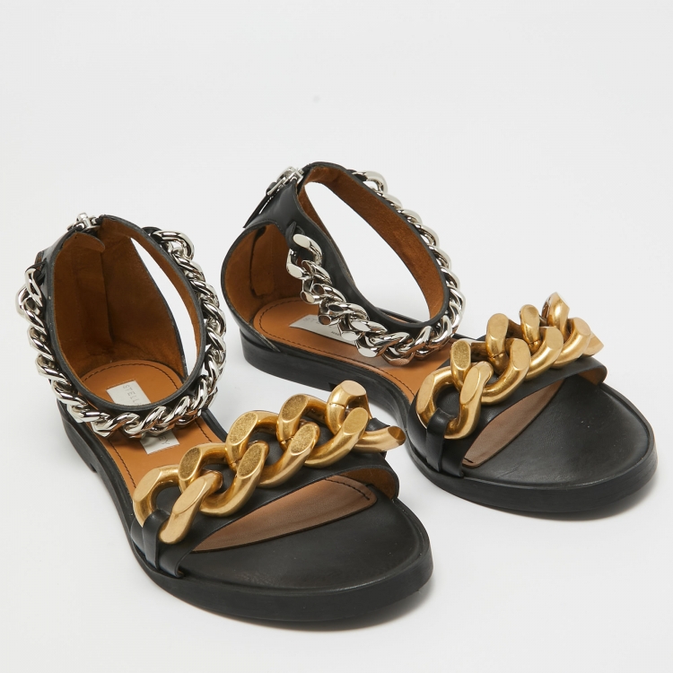 Pre Owned Stella McCartney Black Faux Leather Chain Link Ankle Strap Flat Sandals Size 38