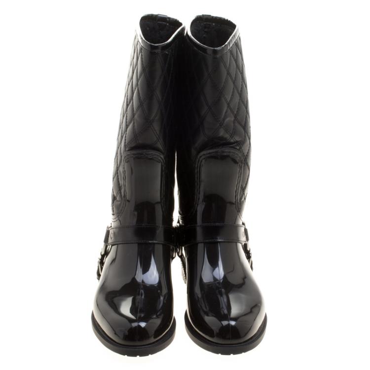 Pre Owned Stuart Weitzman Black Leather and Rubber Stirrup Rain Boots Size 39