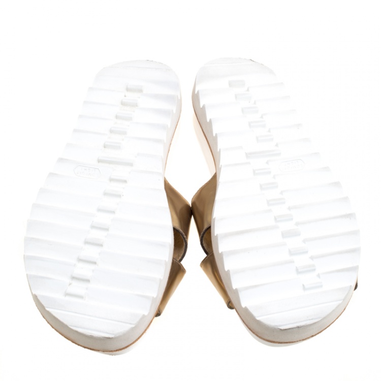Pre Owned Stuart Weitzman Metallic Gold Leather Crisscross Slides Sandals Size 37