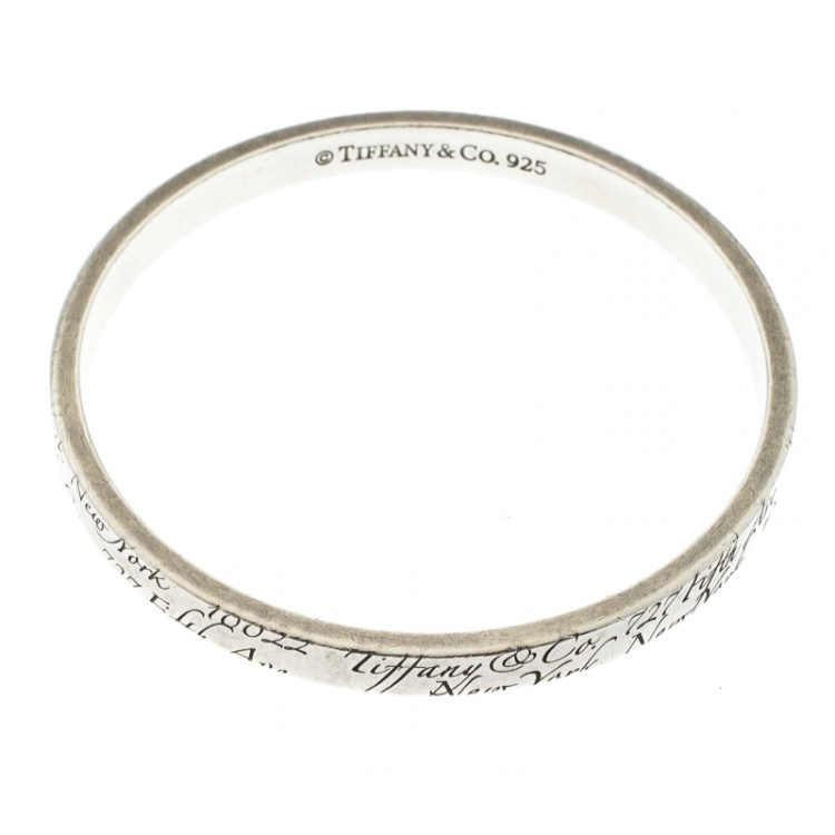 Pre Owned Tiffany & Co. Notes Engraved Silver Bangle Bracelet 19cm