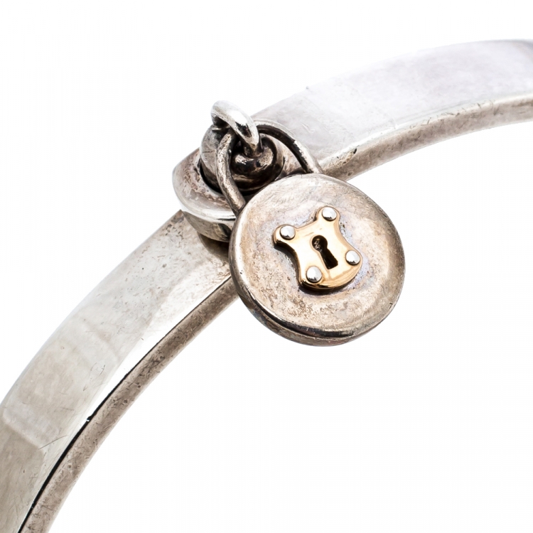 Pre Owned Tiffany & Co. Silver 18K Gold Round Lock Charm Bangle Bracelet
