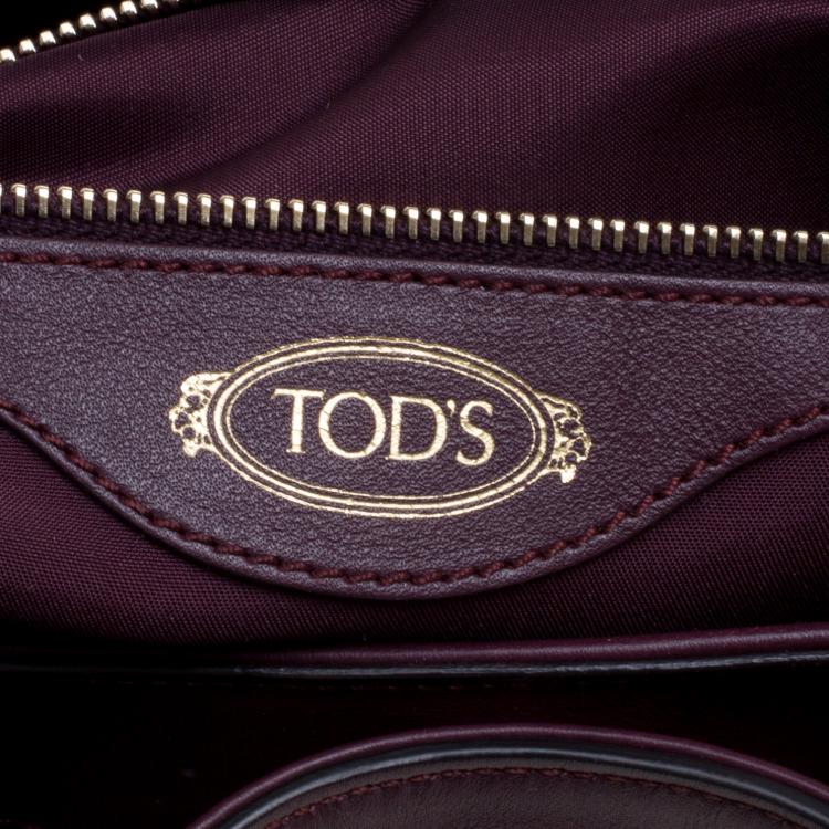 Pre Owned Tod's Burgundy Laser Cut Leather Medium Flower Tote