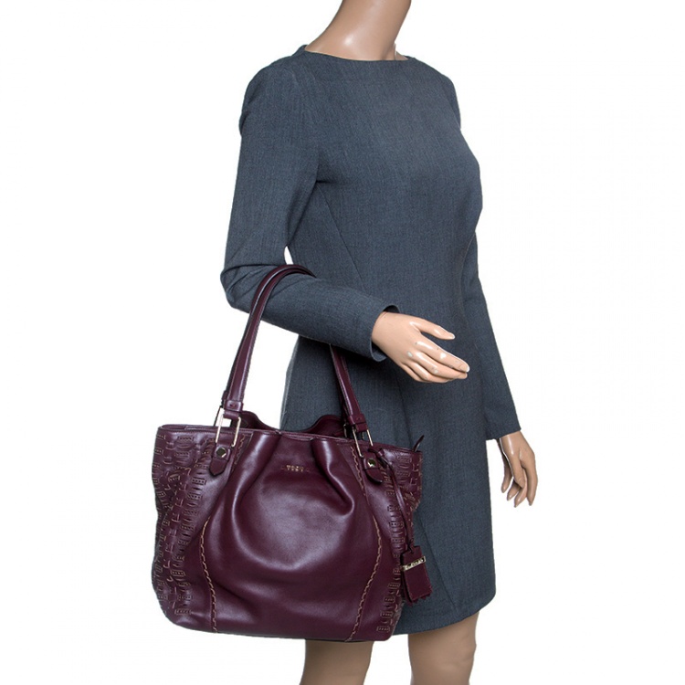 Pre Owned Tod's Burgundy Laser Cut Leather Medium Flower Tote